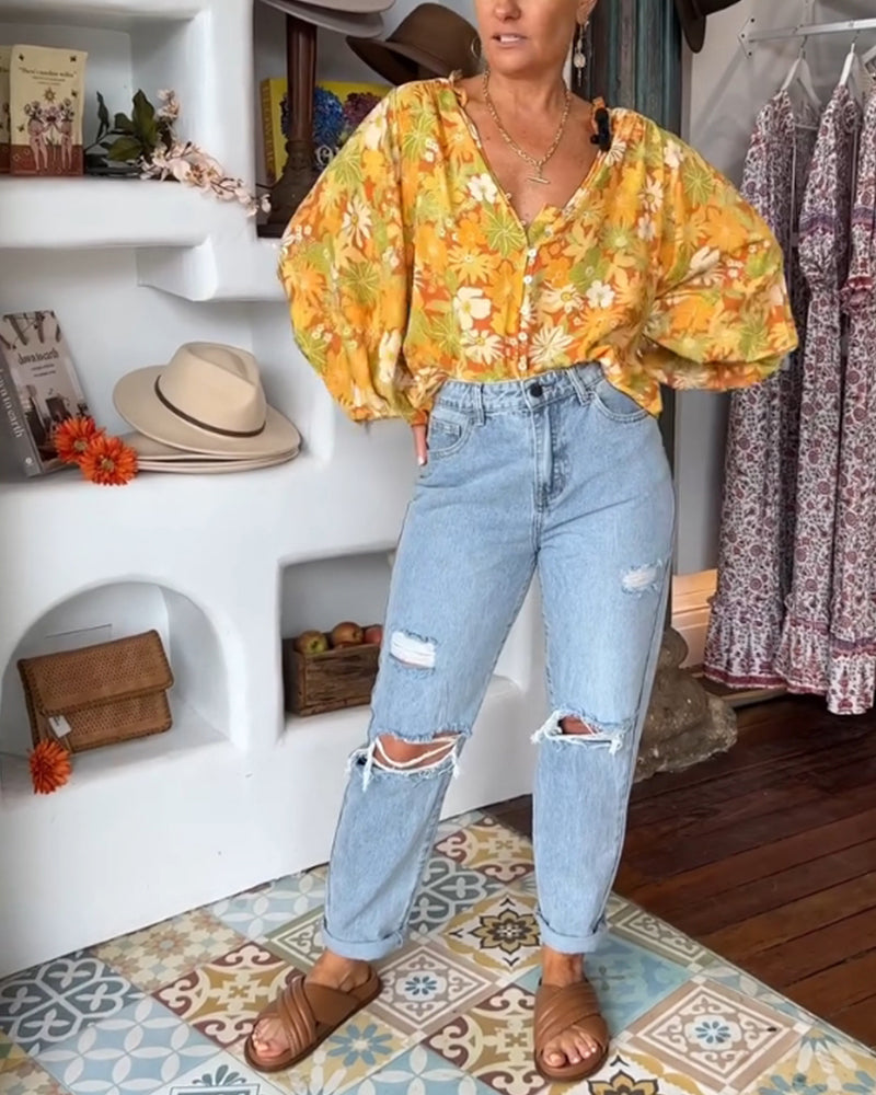 V-hals bluse med blomstertrykk