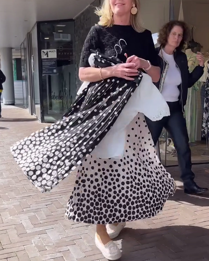 Elegant plissert skjørt med prikker
