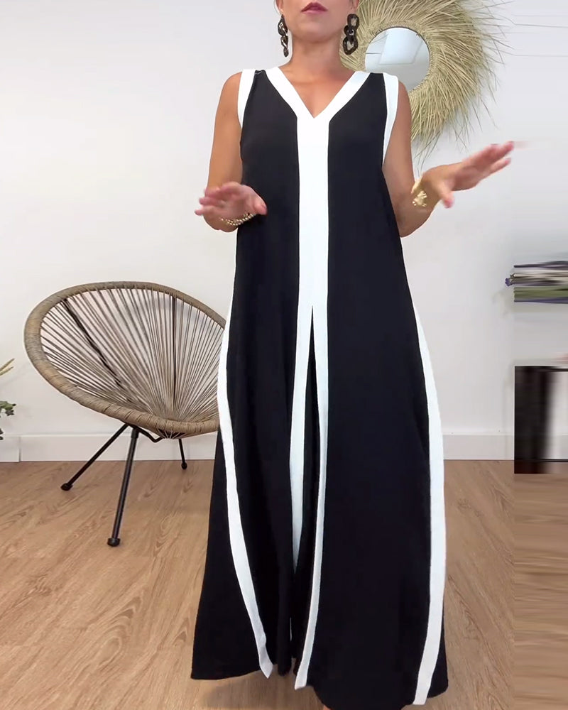 Fasjonabel ermeløs kjole med V-hals i kontrasttrykk