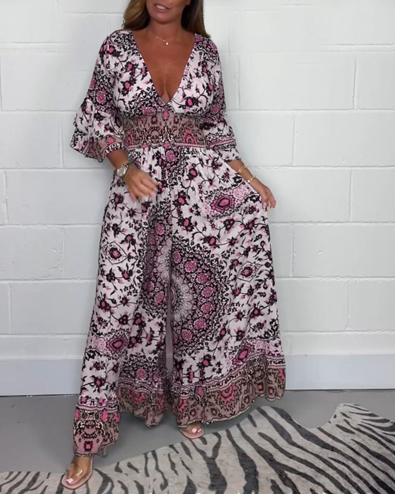 Jumpsuit med trykk og dyp V-hals