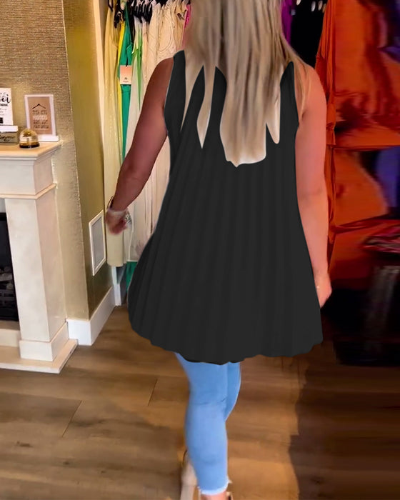 Ermeløs topp med volanger og jakkeslag