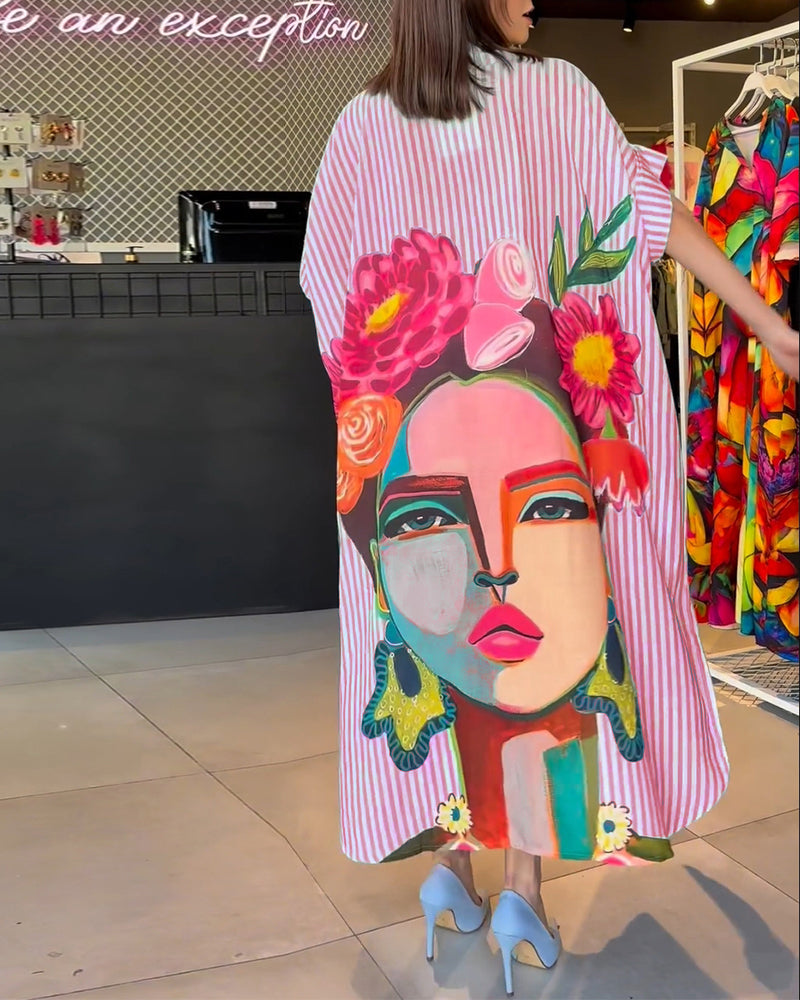 Vertikal stripete jakkeslagsbluse med karaktertrykk