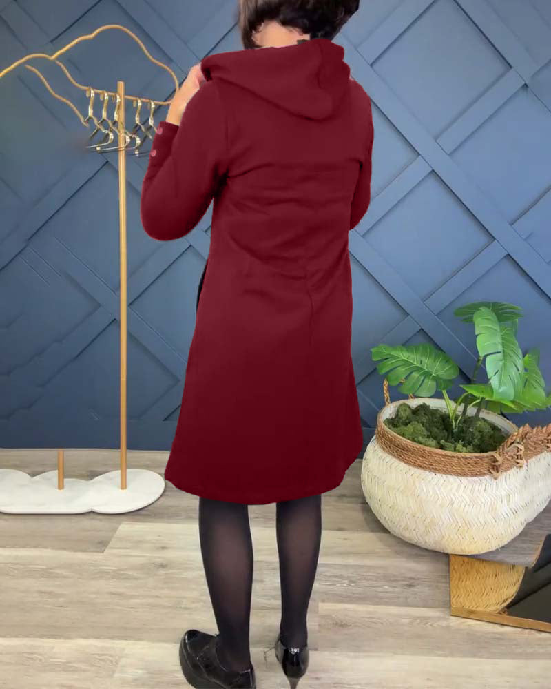 Uformell kjole med hette og hette med sirkeltrykk