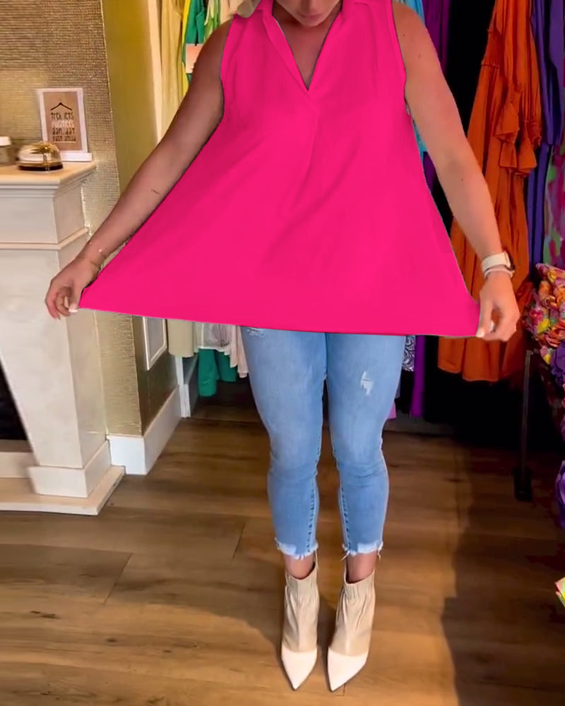 Ermeløs topp med volanger og jakkeslag