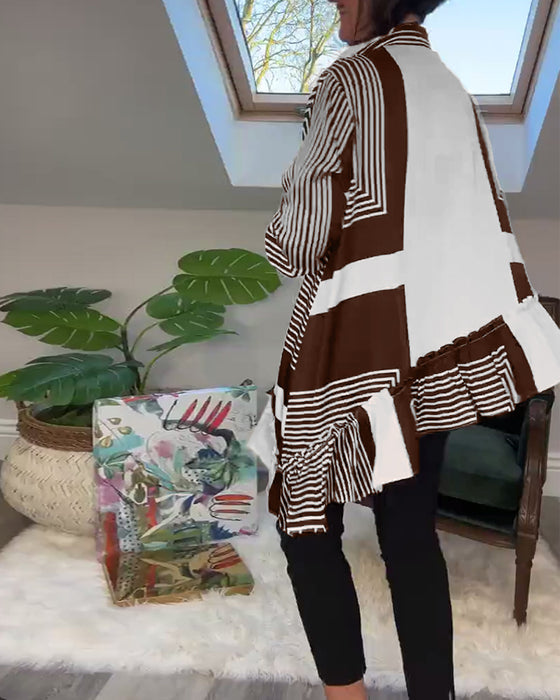 Uregelmessig patchworkskjorte med motetrykt knapp