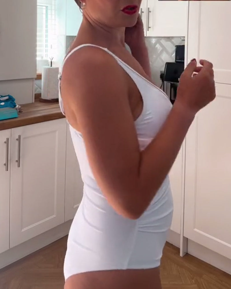 Ensfarget badedrakt med skjøtet mesh