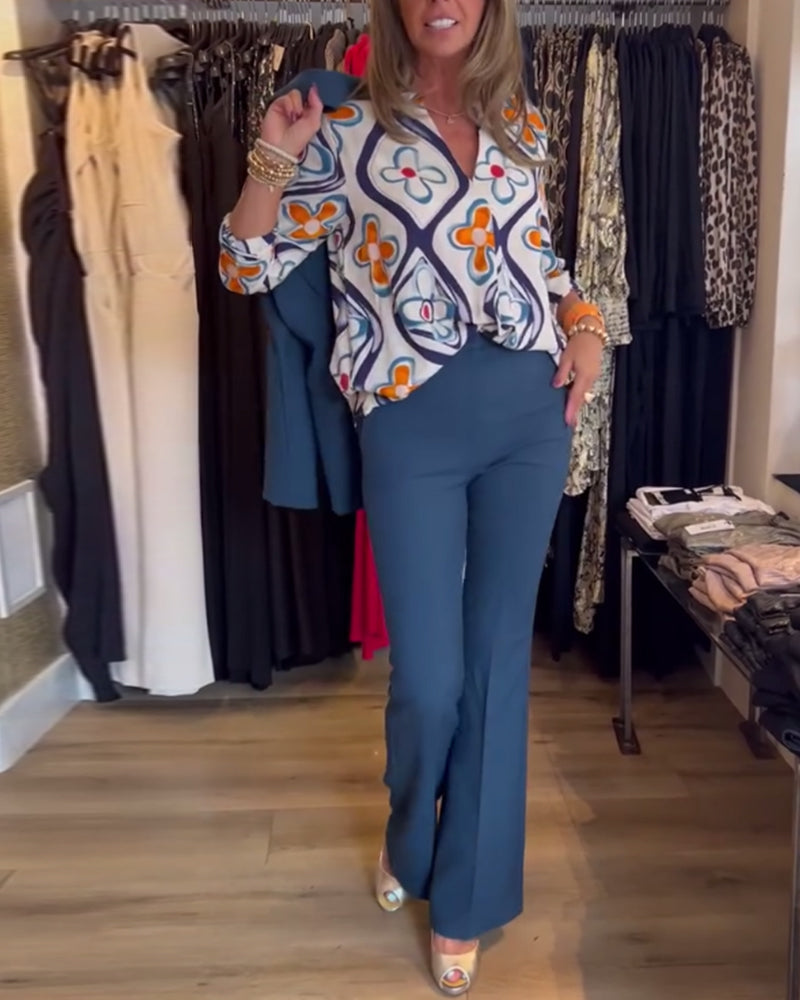 Bluse med V-hals og blomster