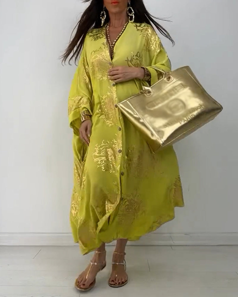 Langermet løs kjole med trykt knapp