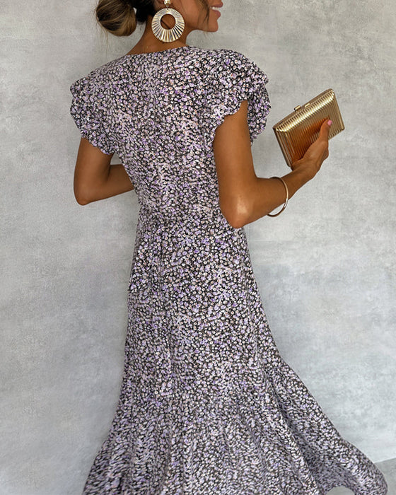 Elegant kjole med volanger og splitt