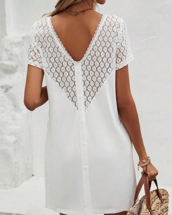 Kjole med rund hals og lappeteppe på ryggen