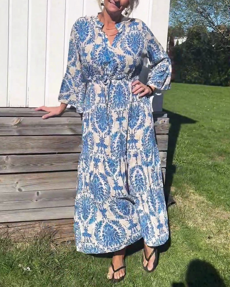 Kjole med snøring med klokkeermer