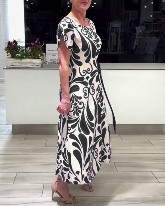 Elegant kortermet kjole med kontrasttrykk