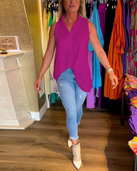 Ermeløs topp med volanger og jakkeslag