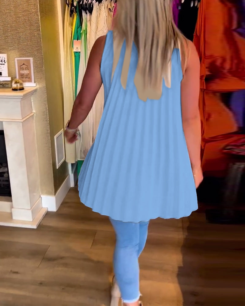 Ermeløs topp med volanger og jakkeslag