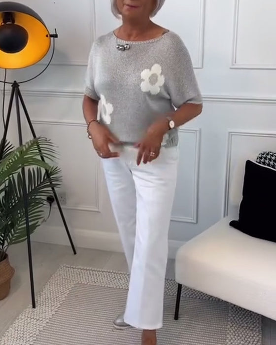 Slank blomstergenser med rund hals