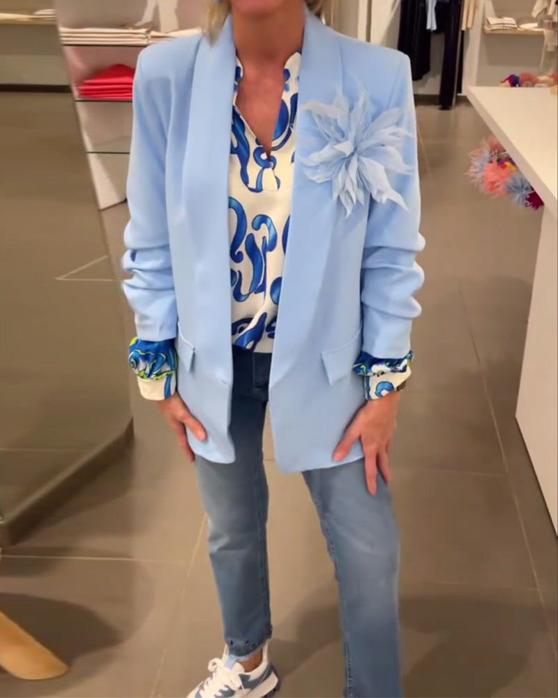 Elegant langermet topp med trykt V-hals