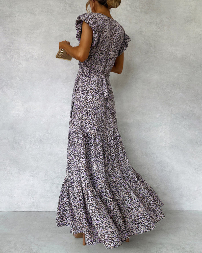 Elegant kjole med volanger og splitt