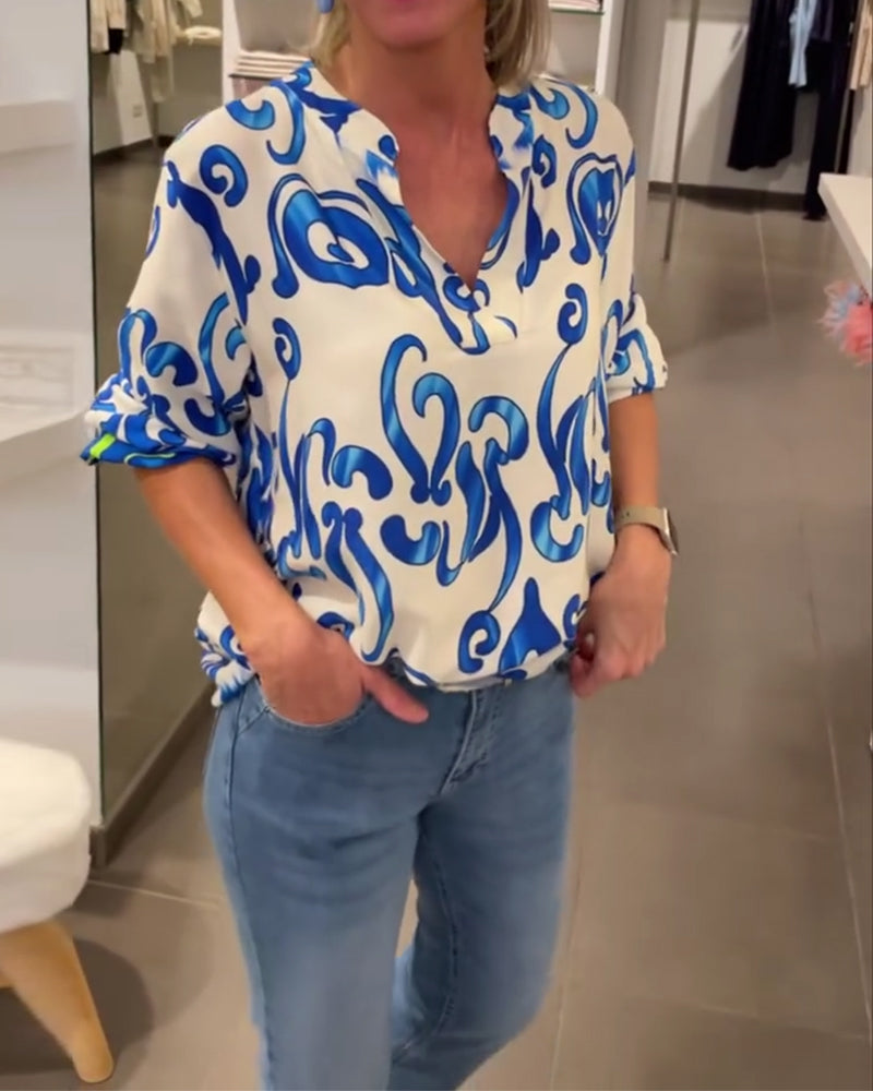 Elegant langermet topp med trykt V-hals