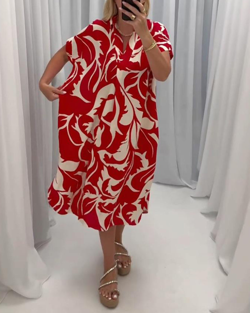 Uformell kjole med slits i kontrasttrykk