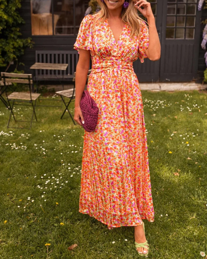 Blomstret kjole med V-hals