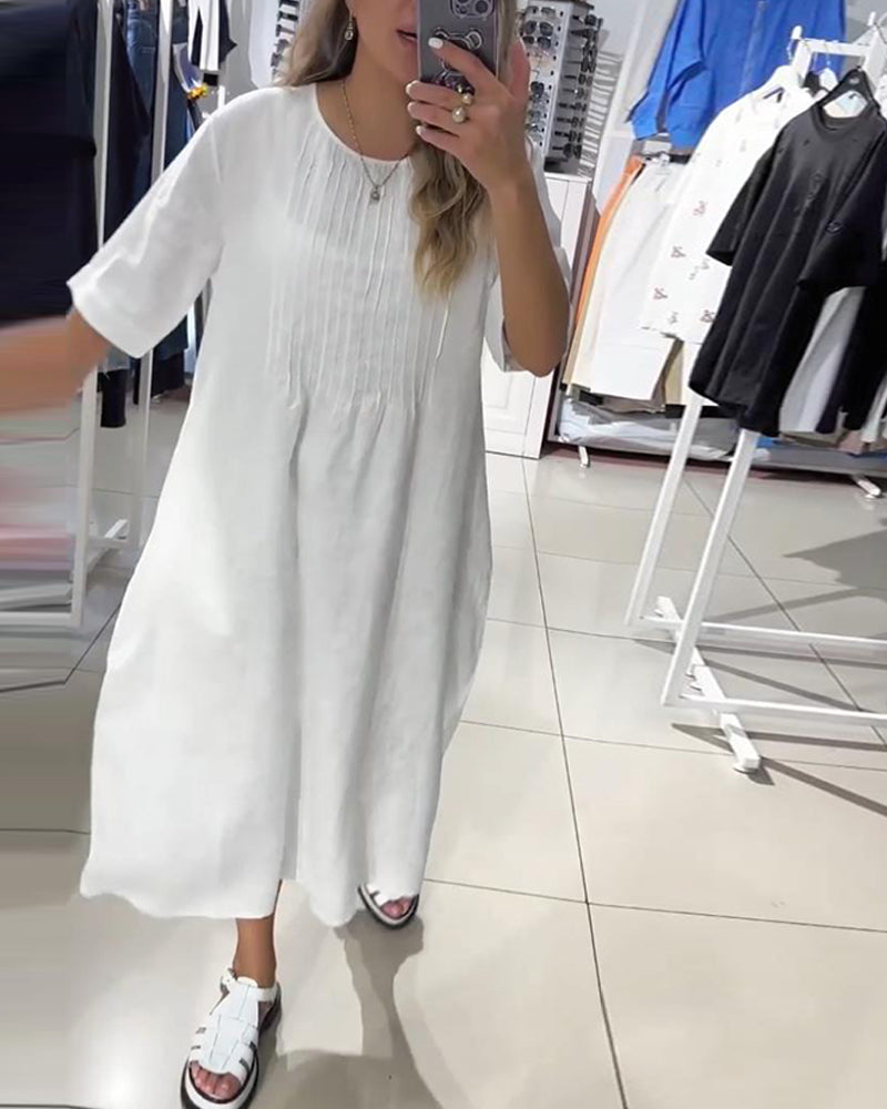 Uformell løs kjole med ensfarget og halve ermer