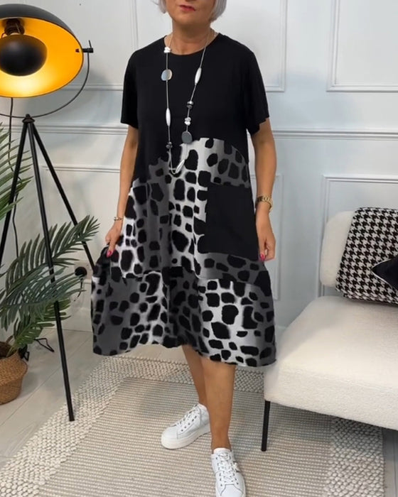 Kortermet kjole med rund hals