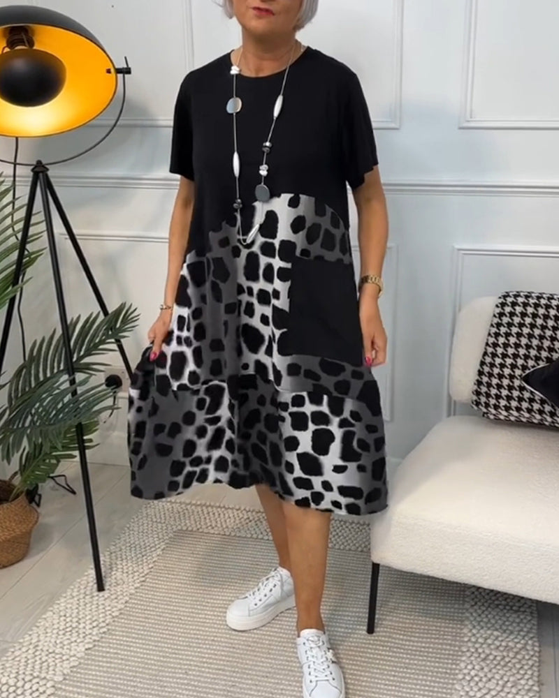 Kortermet kjole med rund hals