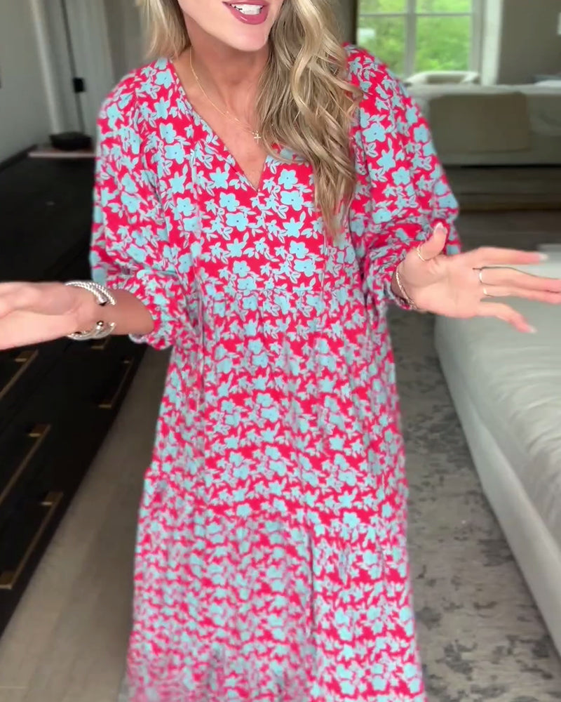 Blomstret lang kjole med V-hals med lanterneermer