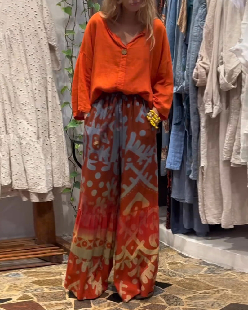 Løse bukser med brede ben med trykt lomme