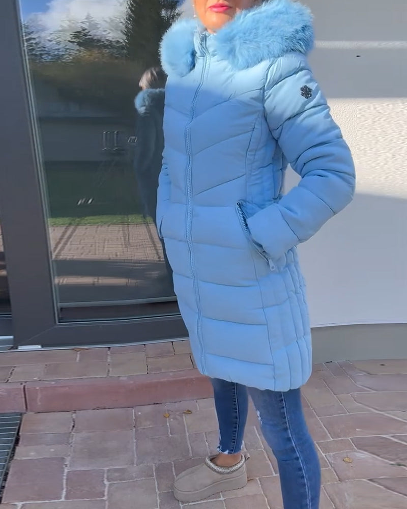 Uformell ensfarget polstret jakke med glidelåslomme