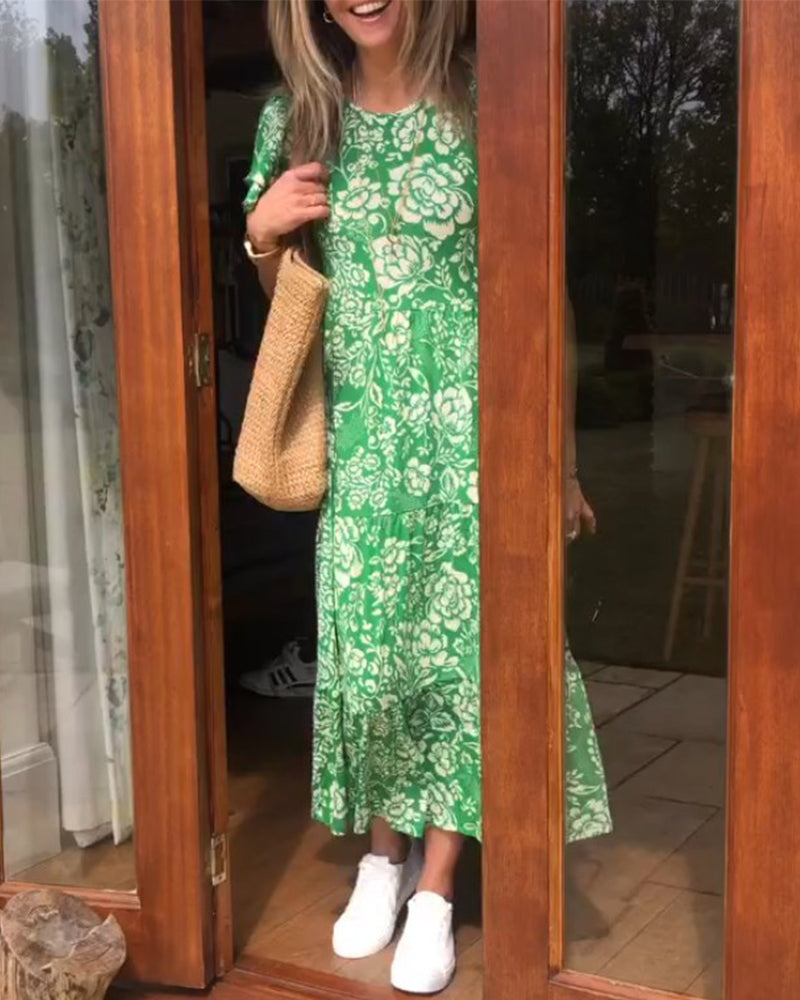 Kortermet lang kjole med blomstertrykk