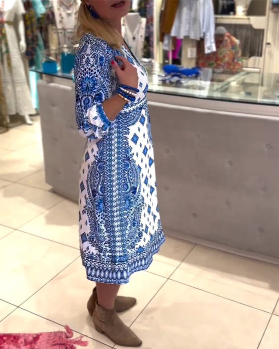 Elegant midikjole med V-hals