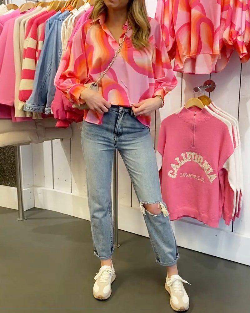 Bluse med revers og lange ermer