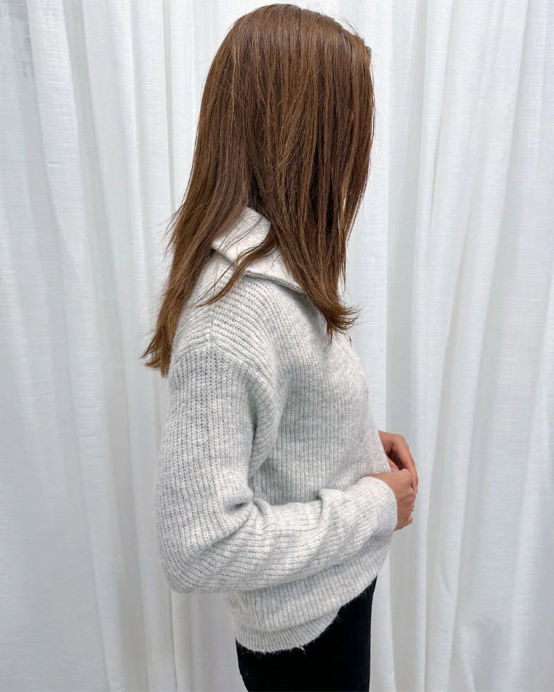 Ensfarget genser med glidelås