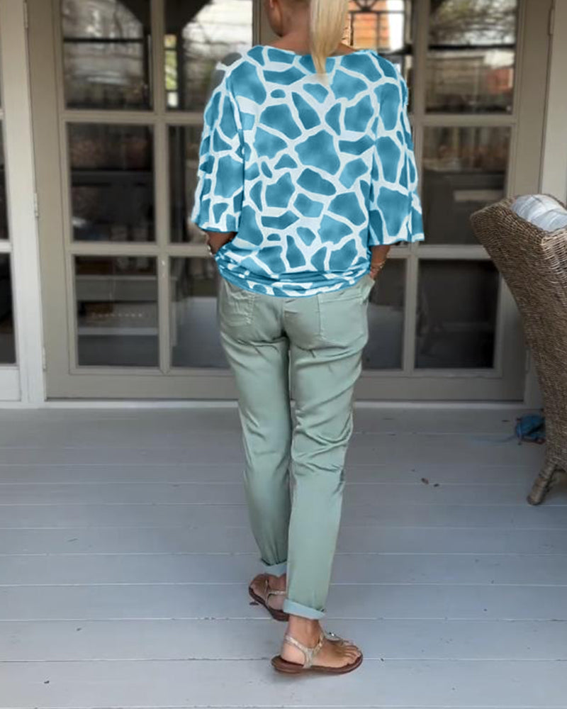 Elegant bluse med V-hals med flaggermusermer