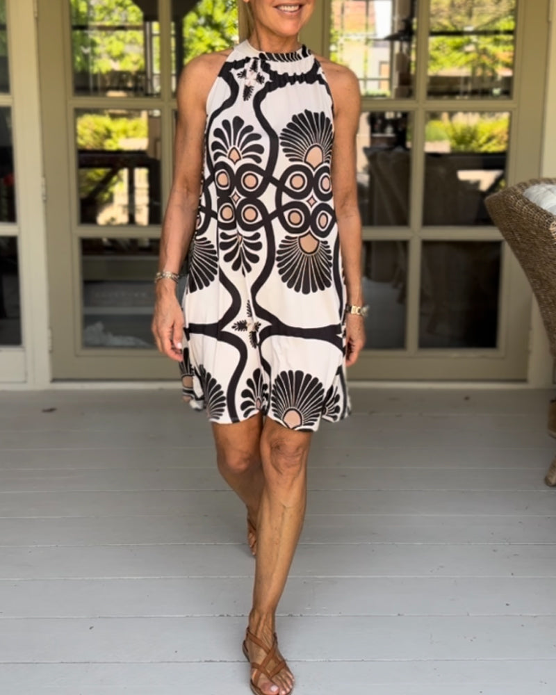 Kjole med halterhals i vintageprint