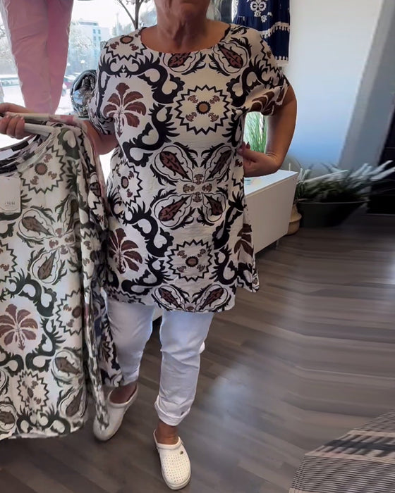 Uformell blomsterbluse med rund hals