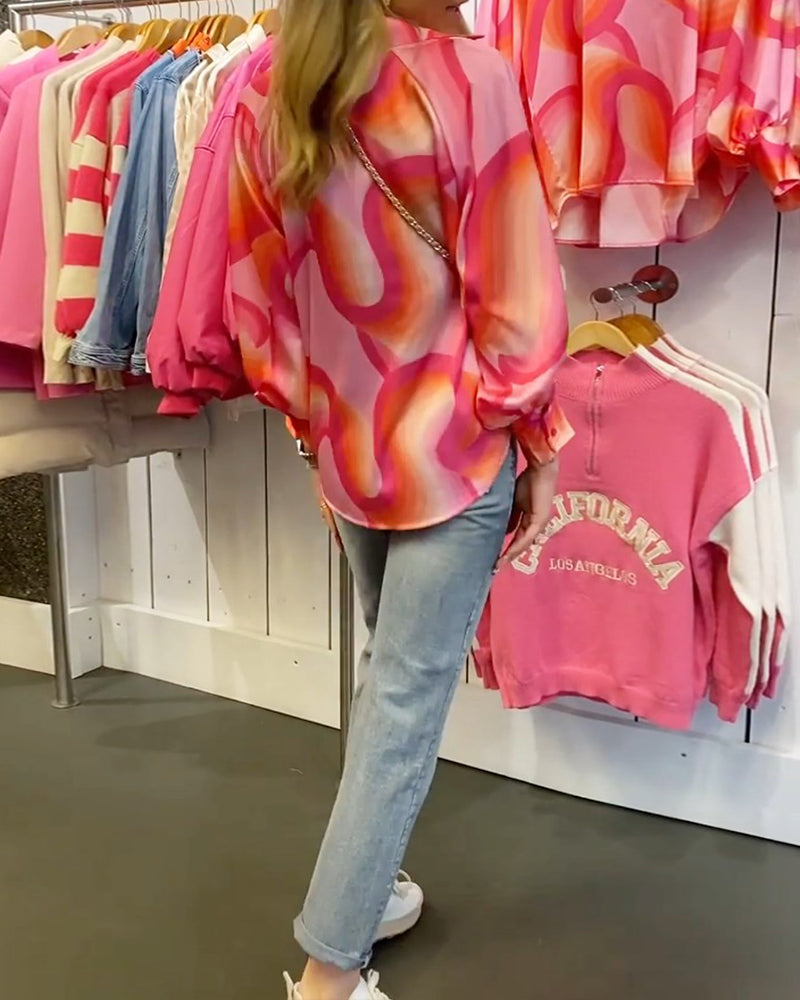 Bluse med revers og lange ermer