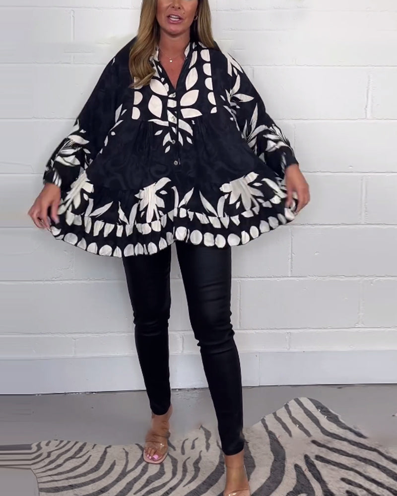 Bluse med klokkeerm med trykk