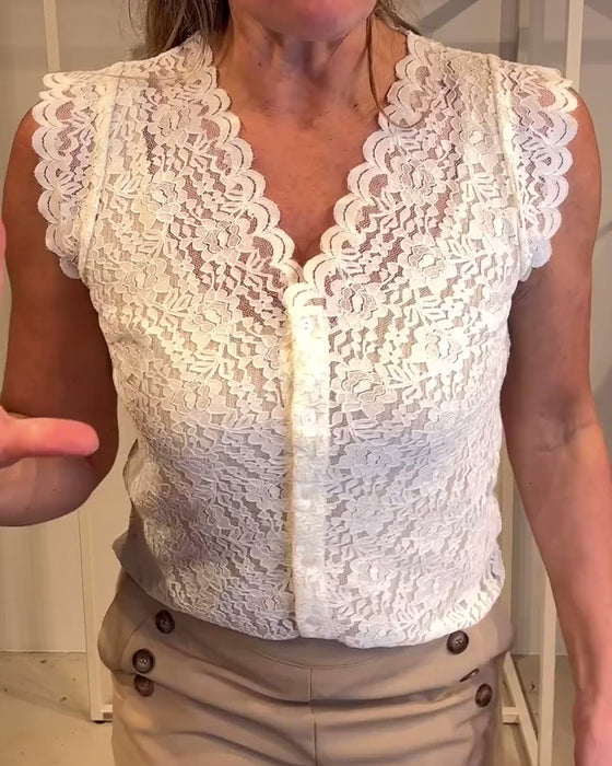 Elegant, ermeløs blondetopp med v-hals