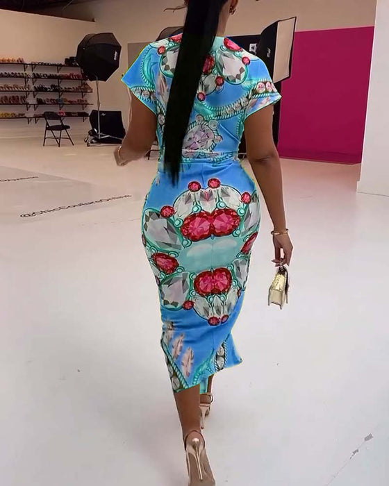 Kjole med dyp V spalt i midjen