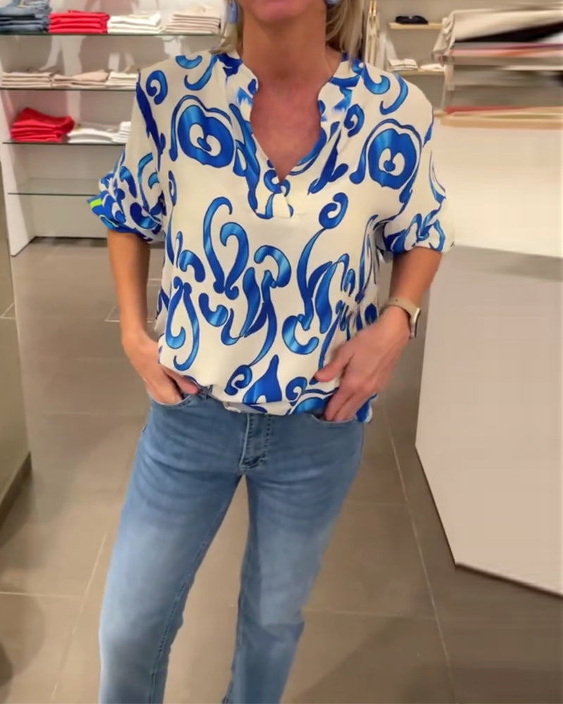 Elegant langermet topp med trykt V-hals