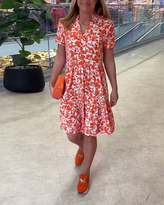 Kortermet midikjole med blomstertrykk