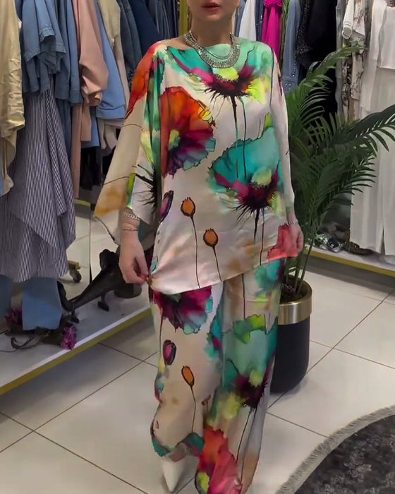 Lotus print sett med en skulder og trekvart erme