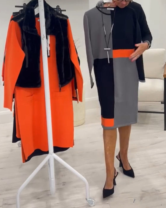 Elegant kjole med rund hals og fire kvadratisk farge