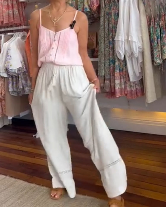 Ensfarget komfortabel bukse med brede ben med lommer