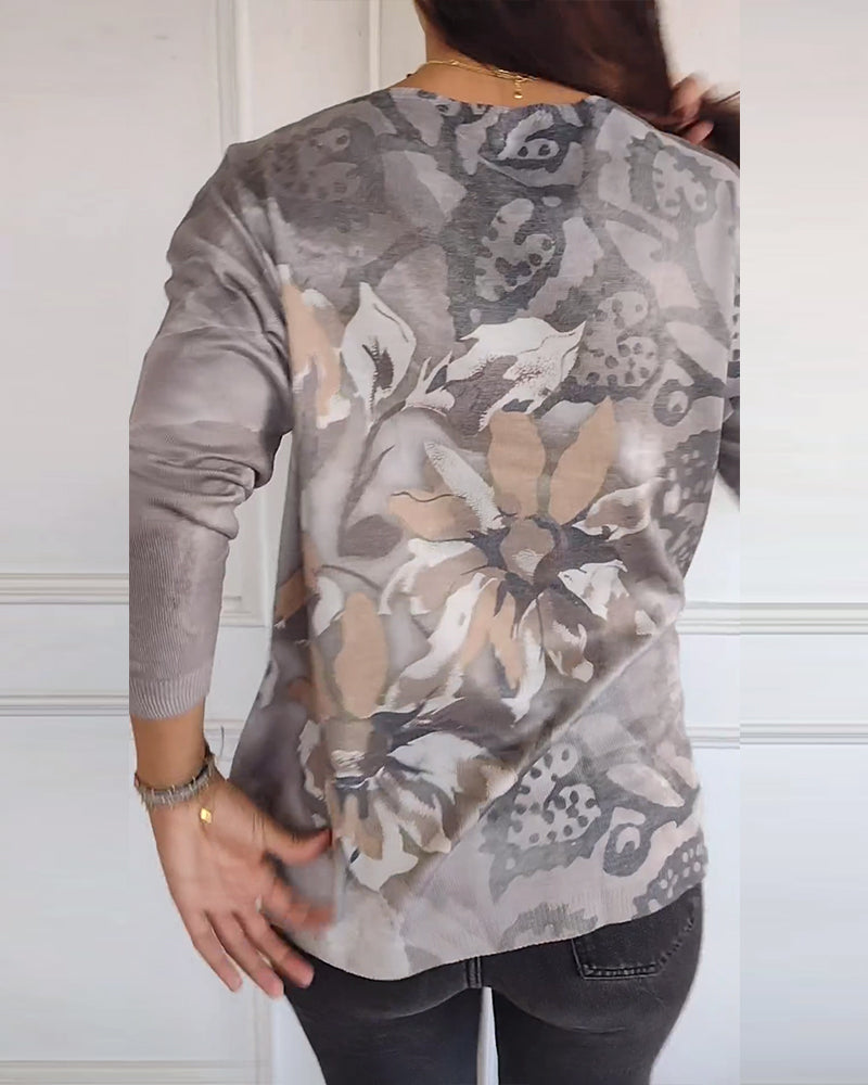 Langermet topp med V-hals og vintage med blomstertrykk