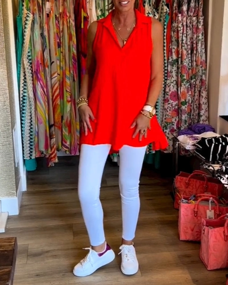 Ermeløs topp med volanger og jakkeslag