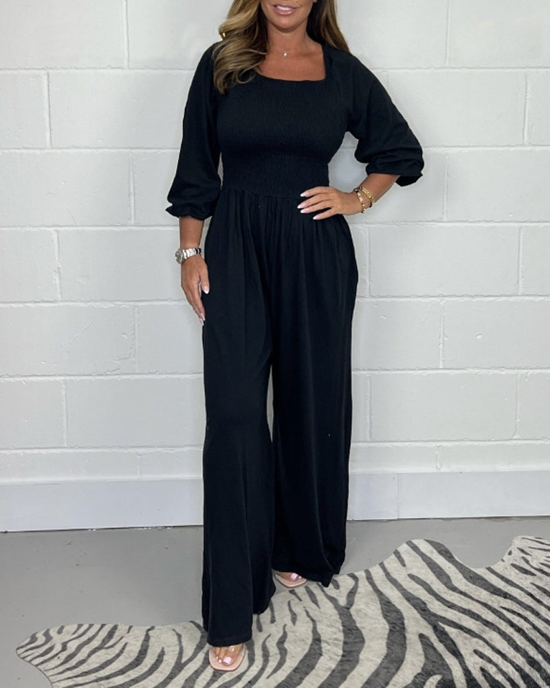 Ensfarget jumpsuit med firkantet hals