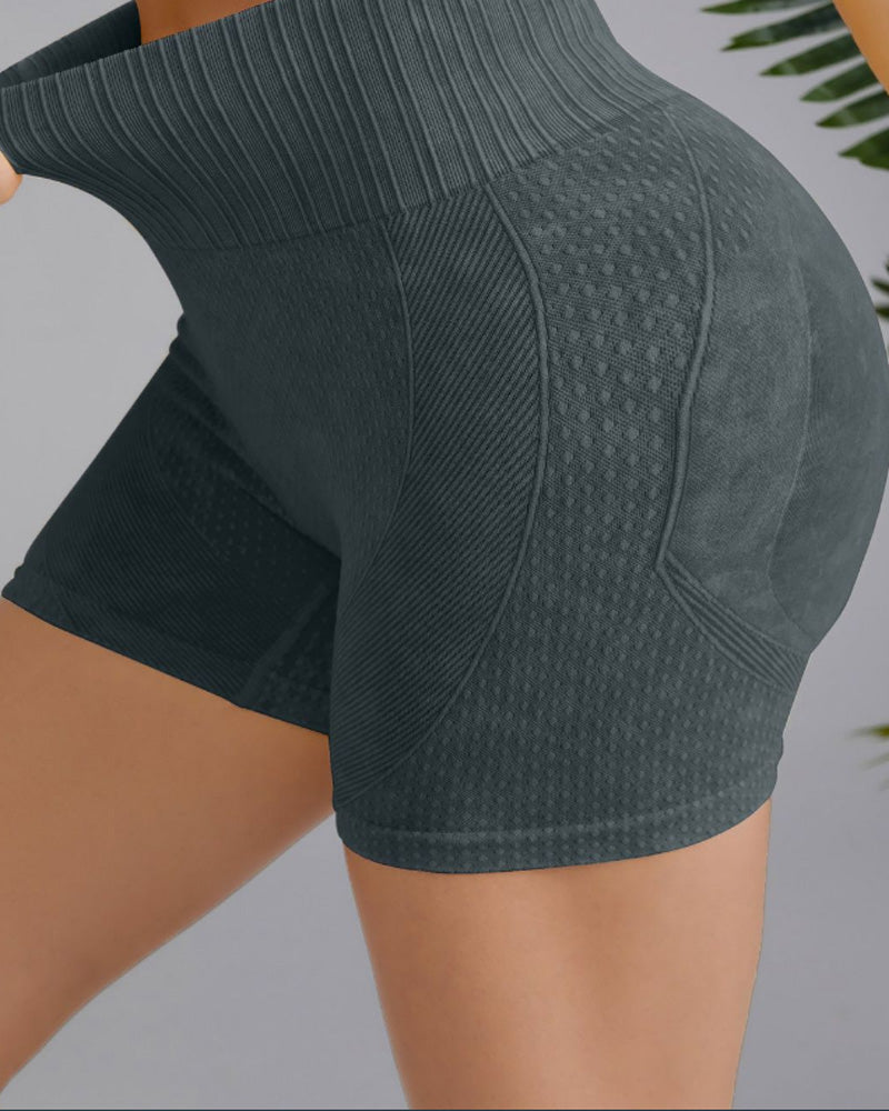 Enkel ensfarget hofteshorts med høy midje